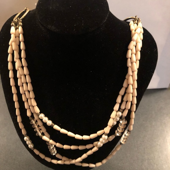 American eagle outfitter necklace with cream bead layered .